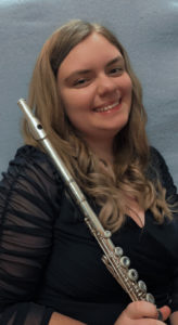 Iceley Self poses with her flute.